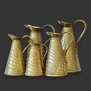 Set of Five Edwardian Brass Jugs