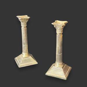 Pair of Solid Silver Corinthian Candlesticks