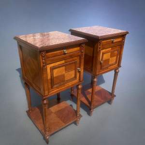 A Pair Of French Walnut Bedside Cabinets