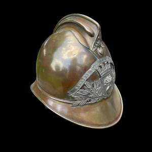 An early 20th Century French Firemans Brass Helmet