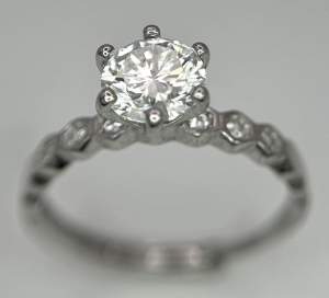 A Round Brilliant D Colour 1ct Moissanite Ring. Size P in Silver