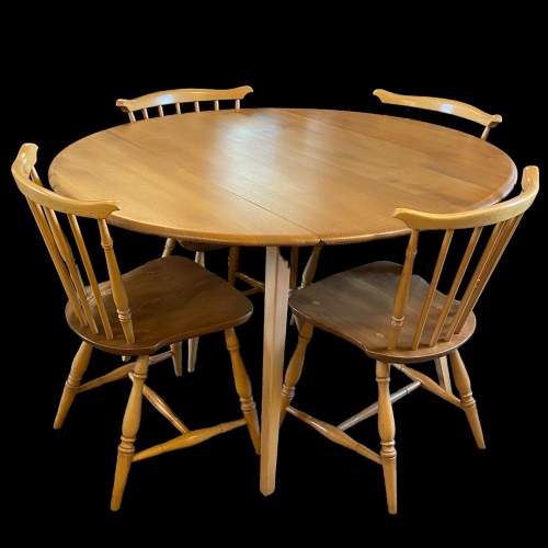 Ercol Light Elm and Beech Dining Table & Four Chairs image-1