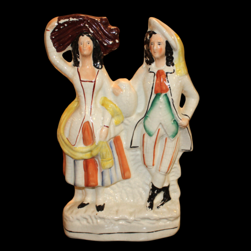 Victorian Staffordshire flat back of man and woman image-1