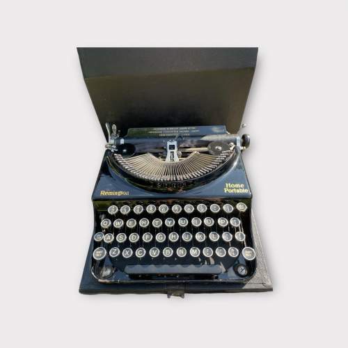 A Vintage Remington Home Portable Typewriter image-1