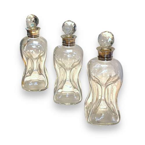 Set of Three Edwardian Silver Collared Glug Glug Glass Decanters image-1