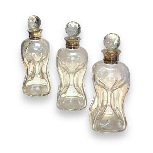 Set of Three Edwardian Silver Collared Glug Glug Glass Decanters