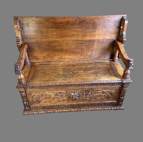 A 19th Century Carved Oak Monks Bench image-1