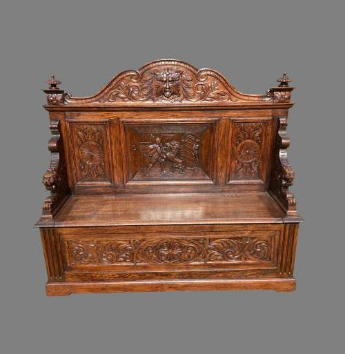 A 19th Century Heavily Carved Box Settle image-1