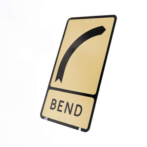 A Vintage Metal Road Sign for a Bend Ahead image-2